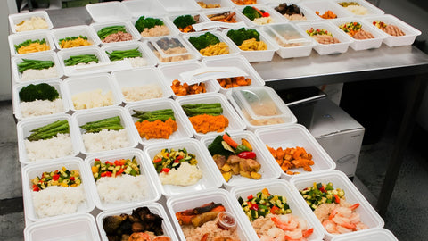 Fresh portioned meal containers with vegetables and proteins prepared by FreshMTL catering in Montreal